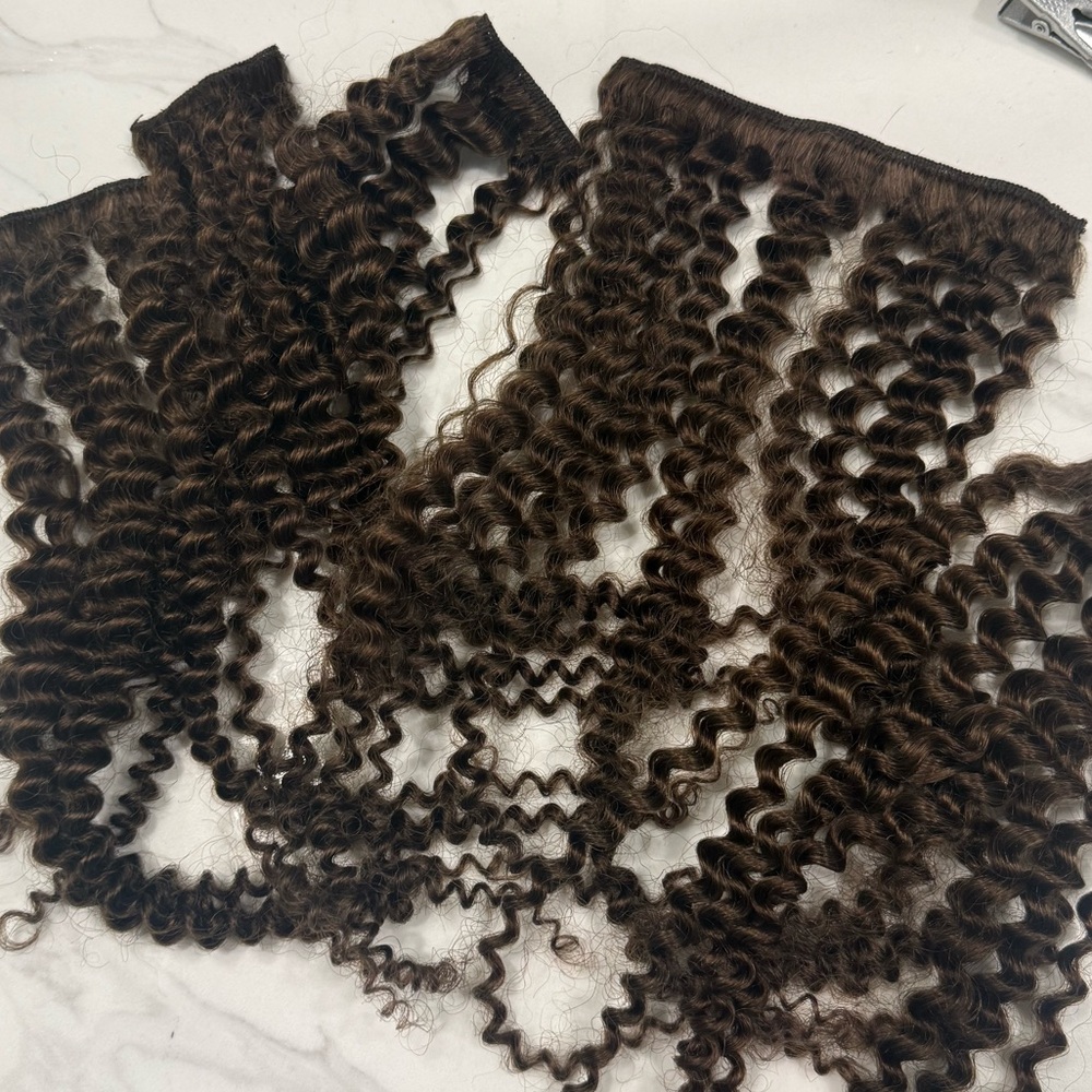 SunnyHair Curly Clip-ins - Real Human Hair Brown